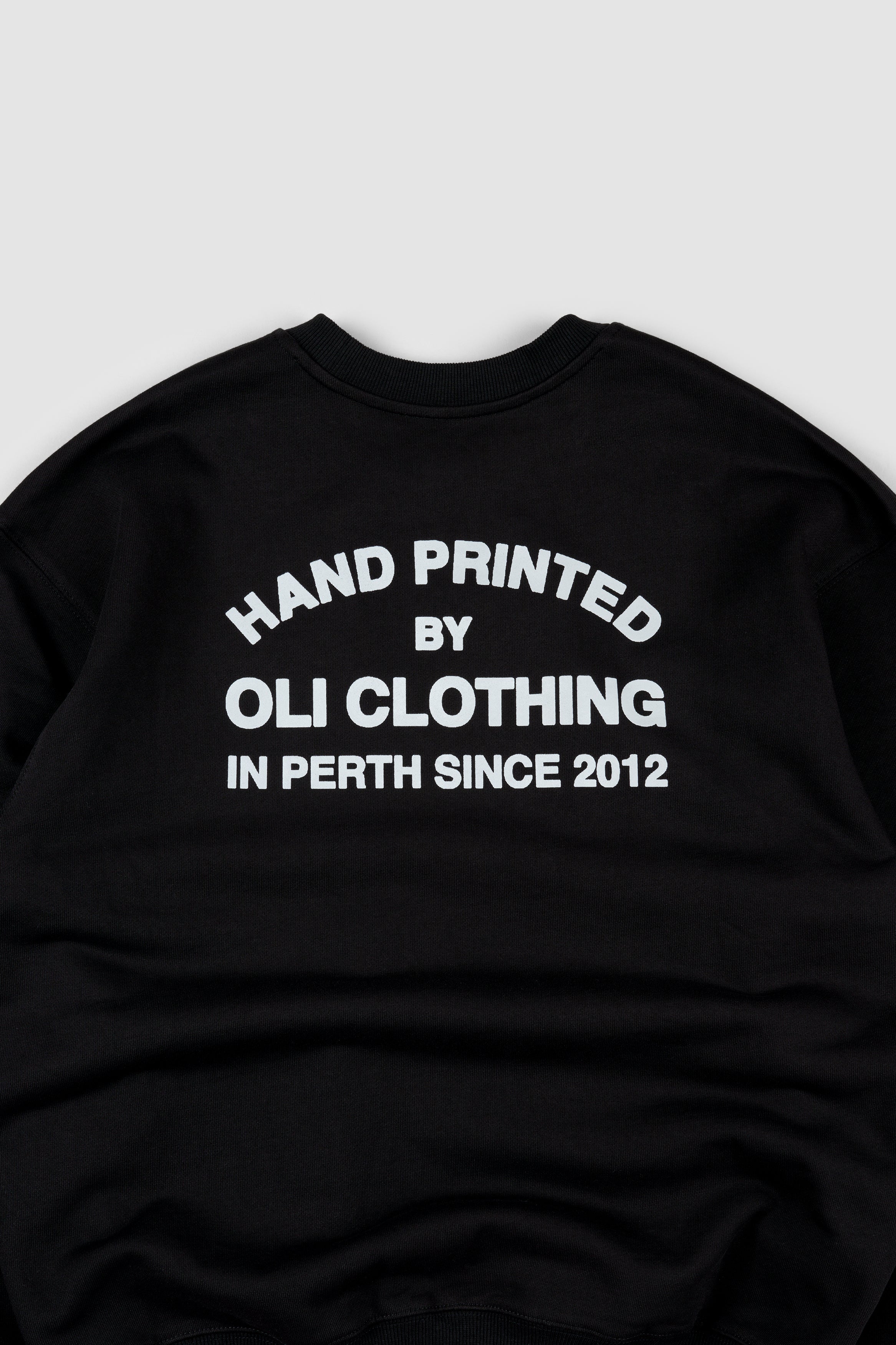 Emblem Back Print Pullover - Black